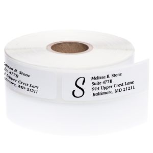 A paper roll of white address labels featuring a bold black letter S initial monogram layout template on a clean white background.