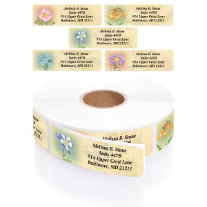 A paper roll of Antique Floral address labels showcasing rotating watercolor illustrations like bluebells and pansies with elegant typography.