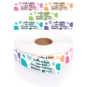 A rectangular personalized address label displayed above a large roll of matching labels, featuring an assortment of colorful graphic dot patterns.