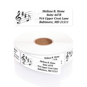 A large roll of white address labels featuring a classic black musical treble clef staff illustration alongside clean typography text.