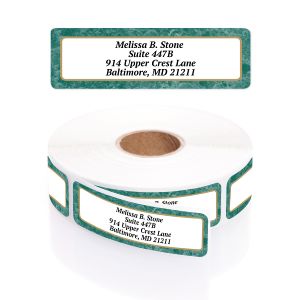 A rectangular personalized address label displayed above a large roll of matching labels, featuring an elegant green marbled texture border.