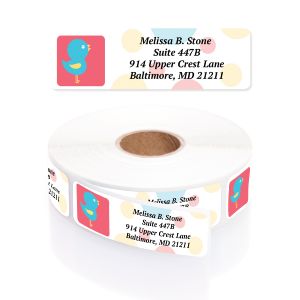 A white paper roll of address labels featuring a cute teal bluebird illustration on a pink background next to a clean four-line layout.
