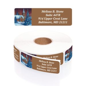 A roll of personalized Evening Chapel rolled address labels with a snow-covered church graphic.