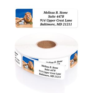 Single personalized address label with a lion and lamb illustration displayed above a rolled coil of return address labels.