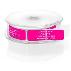 A rectangular personalized address label displayed above a large roll of matching labels, featuring a minimalist hot pink background with white text.