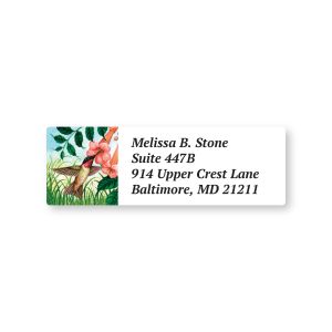 A rectangular personalized address label showcasing a vibrant watercolor ruby-throated hummingbird sipping nectar from a pink flower.