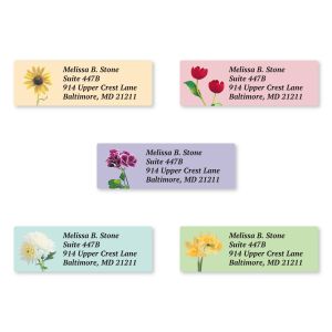 A collection of five rectangular address labels, each displaying a different vibrant, colorful illustrated floral blossom design.