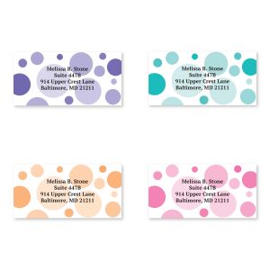 A grid of four personalized address labels featuring colorful graphic dot patterns in purple, teal, orange, and pink next to custom text.
