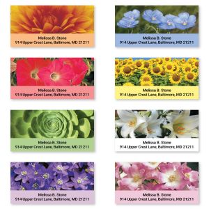 A grid of eight rectangular address labels, each featuring a different vibrant, close-up floral photo design next to custom text fields.