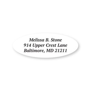 A close-up of a white oval-shaped address label showcasing a clean, elegant layout with custom centered text lines and no border.