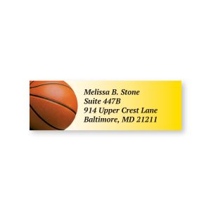 Yellow rectangular address label featuring a basketball graphic on the left with personalized four-line name and address text in italics.