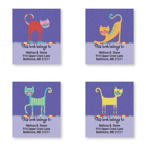 Personalized bookplate label featuring an assortment of colorful stylized cat illustrations above 'This book belongs to' and custom owner name.