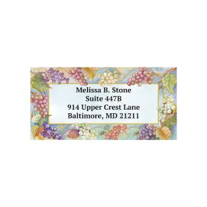Rectangular address label featuring a lush grapevine border with purple grapes above four lines of personalized return address text.