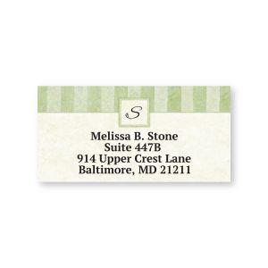 Single personalized Tailored Elegance address label featuring a green striped banner with monogram S above custom name and address text.