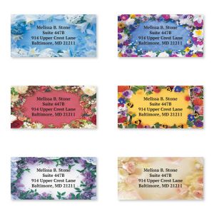 A grid of six rectangular address labels, each displaying a different vibrant watercolor floral illustration border next to custom text.