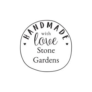 Round stamp design featuring 'HANDMADE with love' arched around tiny hearts above two lines of customizable business name text.