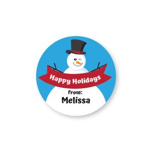 Round goodie label with a smiling snowman in a black top hat on a blue background, a red 