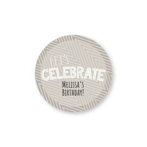 Round personalized label featuring a grey abstract chevron pattern behind white text reading 