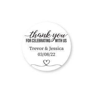 Round black and white thank you label reading Thank You For Celebrating With Us with sample personalized names and wedding date.