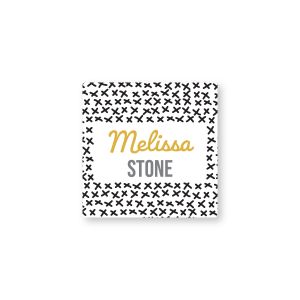 Square water-resistant name label featuring a black and white X pattern border printed with custom text reading 