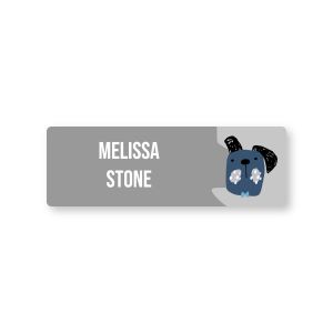Rectangular water-resistant name label featuring a blue illustrated puppy dog illustration and custom text reading 