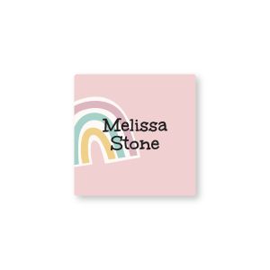 Personalized square water-resistant name label featuring a soft pastel rainbow illustration on pink background with custom owner name text.
