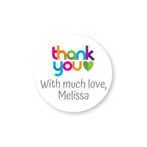 Round personalized label featuring colorful text reading 