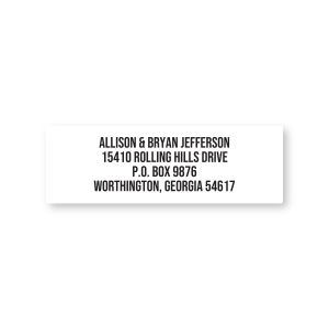 A close-up of a single rectangular white address label with a simple, clean layout and neat black sans-serif font for custom text.