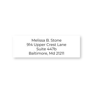 A close-up of a single rectangular white address label featuring a clean design with a simple, classic serif font layout for custom text.