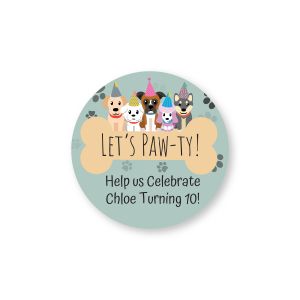 Round sticker featuring dogs wearing party hats above a dog bone with text reading 