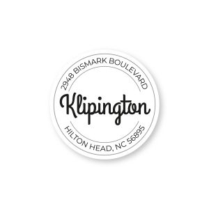 A crisp white, circular address label featuring a clean curved border layout for the street name, city, state, and zip code.