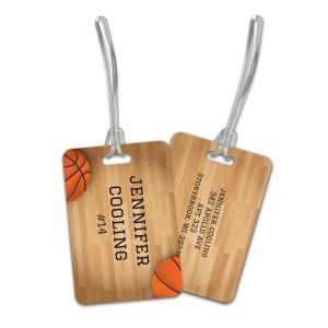 Rectangular plastic luggage tag with a basketball court pattern, clear strap, and personalized text reading 