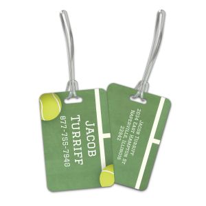 Green tennis court-themed plastic luggage tag showing white custom name text on front and full address details on back with strap.