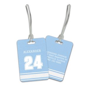 Rectangular Carolina blue and white sports jersey luggage tag displaying a custom jersey number on front and personalized contact lines on back.
