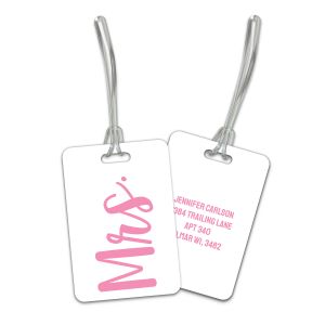 Rectangular white luggage tag with pink script text reading 