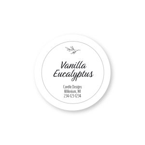 Round black and white product label featuring a delicate greenery sprig drawing above customizable text reading Vanilla Eucalyptus.