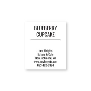 Rectangular white product label displaying BLUEBERRY CUPCAKE in bold uppercase text separated from custom business text below by a line.