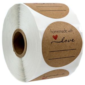 A roll of round brown kraft paper stickers, with the top label clearly showing 