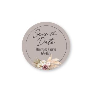 Round taupe sticker featuring script text 
