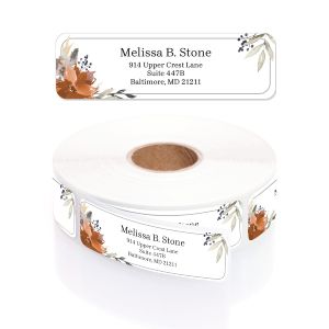Single personalized address label with modern watercolor floral artwork displayed above a rolled coil of return address stickers.