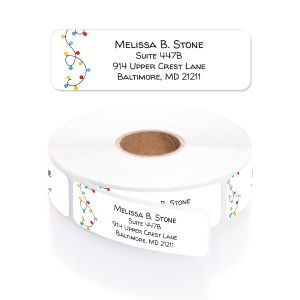 Roll of Christmas String Lights address labels featuring festive colorful bulb illustrations and clean, clear personalized address printing.