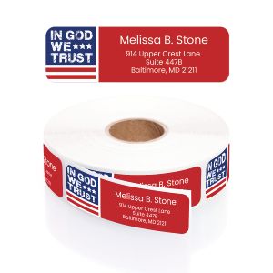 A large roll of white address labels featuring a bold red, white, and blue American flag graphic alongside crisp personalized typography.