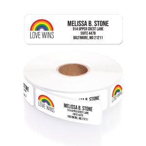 Single personalized address label with a vibrant Love Wins rainbow graphic displayed above a rolled coil of return address stickers.