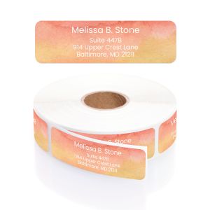 Single personalized address label with coral and orange watercolor background displayed above a rolled coil of return address stickers.