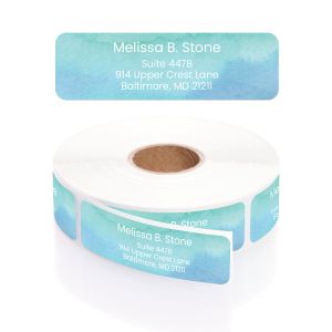A close-up of a rolled address label featuring a beautiful, soft aqua-blue watercolor background wash paired with elegant white text.