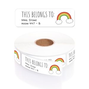 A white paper roll of classroom name labels featuring a colorful rainbow and cloud illustration next to a neat 