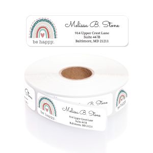 Roll of Be Happy Rainbow address labels featuring a muted pastel rainbow graphic, small heart, 