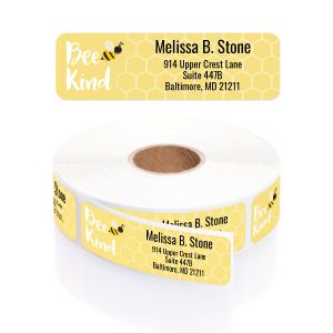 Single personalized address label featuring a cheerful bumble bee and Bee Kind text displayed above a roll of return address stickers.