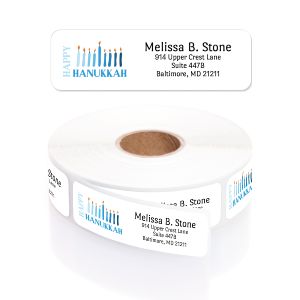 A white paper roll of Hanukkah address labels featuring a modern blue menorah illustration and clean four-line typography layout template.