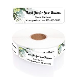 Greenery Thank You For Your Business roll labels showing a single label preview alongside a large rolled stack of white labels with green leaves.